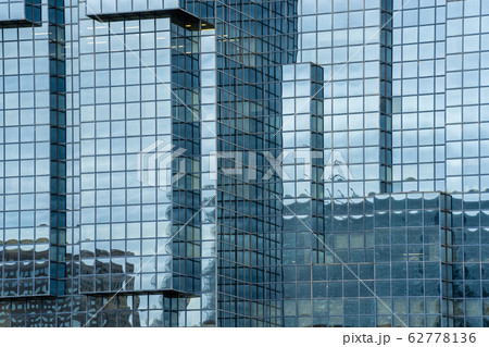 A fragment of the steel and glass modern building structure A fragment of the steel and glass modern building structure 62778136