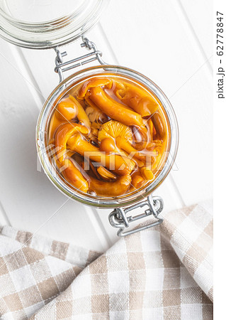 Pickled mushrooms. Marinated mushrooms. 62778847