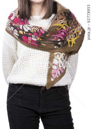 Female scarf made of felted wool on a girl Female scarf made of felted wool on a girl 62778955