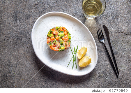 PERUVIAN FOOD. Salmon ceviche with avocado, spring 62779649