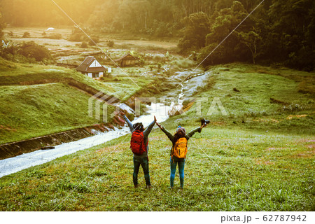 Couples asian Travel, take pictures of nature landscape the beautiful sunrise at Pang-ung. 62787942