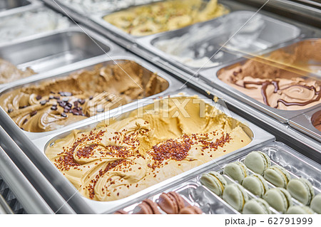 Caramel Gelato. Flavors various ice cream in Rome, Italy. Italian gelateria. Assortment of colorful gelato on cafe showcase. Natural fresh ice cream. Caramel Gelato. Flavors various ice cream in Rome, Italy. Italian gelateria. Assortment of colorful gelato on cafe showcase. Natural fresh ice cream. 62791999