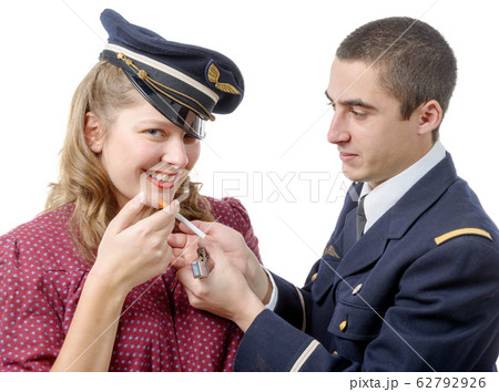 French officer lights a cigarette girl in retro 62792926