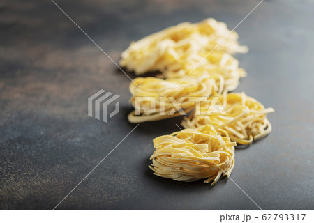 italian raw pasta tagliatelle italian raw pasta tagliatelle 62793317