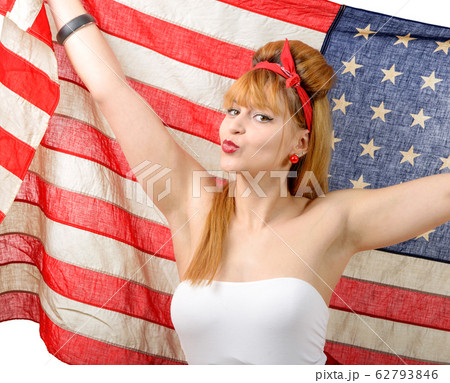 Sexy pin up girl  holding an American flag. 62793846