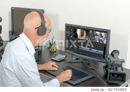 video editor in his studio 62793903
