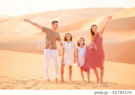 People among dunes in Rub al-Khali desert in United Arab Emirates 62795374