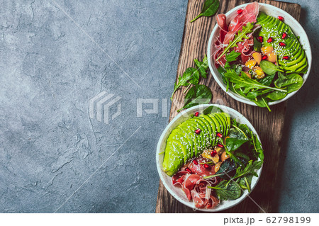 Low carbs bowl. Fresh salad with green spinach, 62798199