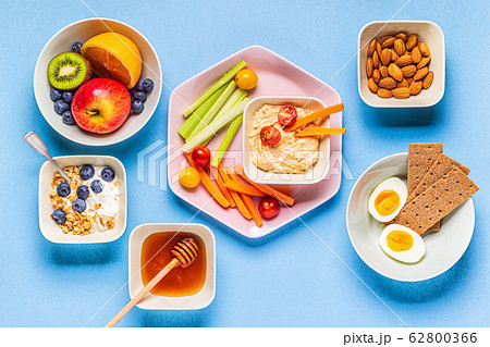 Healthy snack on a pastel background. Healthy snack on a pastel background. 62800366