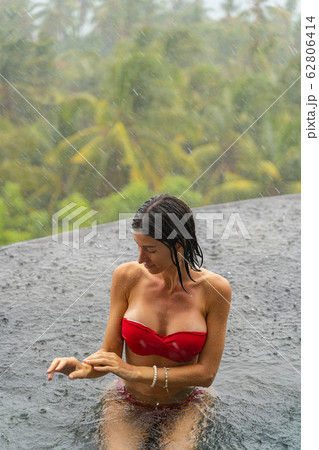 Girl enjoying her stay at a holiday resort Girl enjoying her stay at a holiday resort 62806414