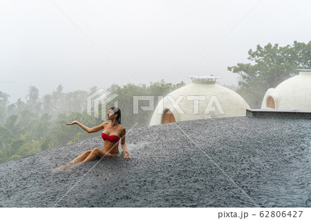 Woman enjoying her amazing weekend in the tropics 62806427