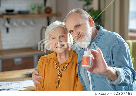 Elderly married good-looking couple demonstrating healthy lifestyle Elderly married good-looking couple demonstrating healthy lifestyle 62807465