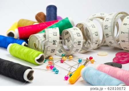 Sewing equipment on white background Sewing equipment on white background 62810072