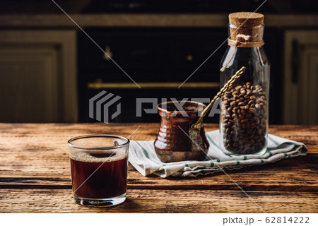 Freshly brewed turkish coffee in drinking glass Freshly brewed turkish coffee in drinking glass 62814222