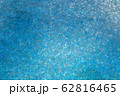 Background of clear glass broken into pieces 62816465