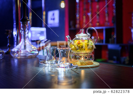 flower tea and two cups on the table 62822378