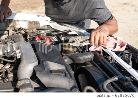 The driver is checking the car before traveling, safety first concept 62825070
