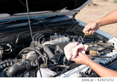 The driver is checking the car before traveling, safety first concept 62825252