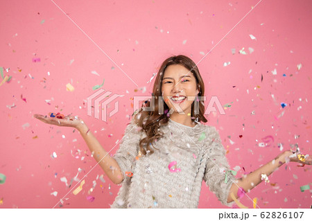 Portrait of a cheerful beautiful Asian womanl Portrait of a cheerful beautiful Asian womanl 62826107