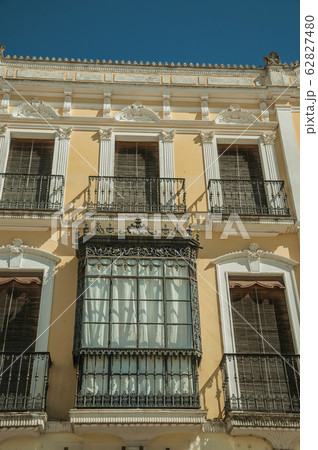 Windows with balcony on old building of Merida Windows with balcony on old building of Merida 62827480