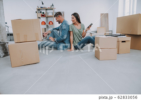 Young woman is looking on laptop screen Young woman is looking on laptop screen 62833056