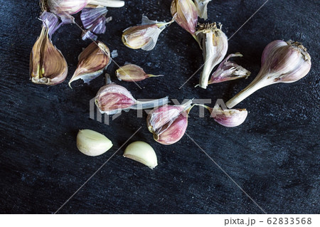 Chapel heads and cloves on a dark background. Flat lay. Copy space Chapel heads and cloves on a dark background. Flat lay. Copy space 62833568