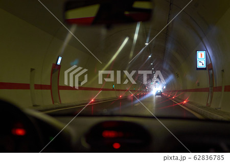 Driving through a tunnel Driving through a tunnel 62836785