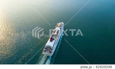 Aerial view Cruise ship at sunset in ocean, Aerial Aerial view Cruise ship at sunset in ocean, Aerial 62839296