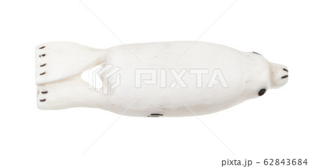 seal figurine carved from walrus ivory isolated 62843684