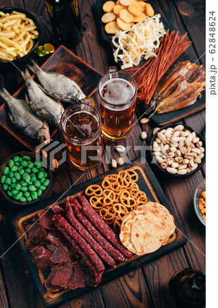 Set of appetizers, salty snacks and light beer Set of appetizers, salty snacks and light beer 62848624