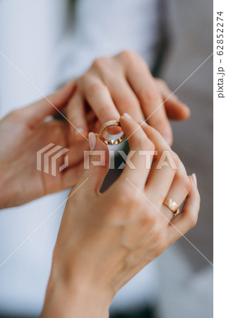 the bride and groom held hands 62852274