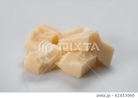 Parmesan cheese chunks on white background 62853060