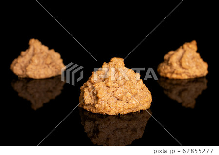 Coconut chocolate biscuit isolated on black glass 62855277