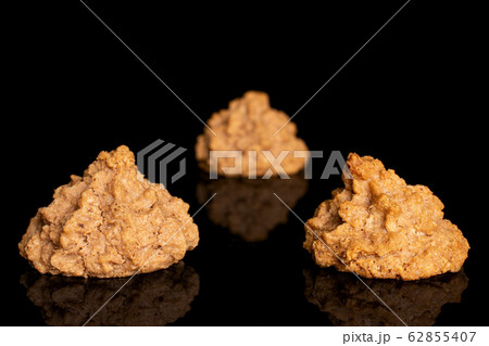 Coconut chocolate biscuit isolated on black glass 62855407
