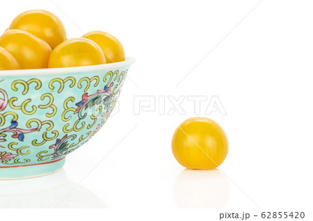 Fresh yellow tomato isolated on white 62855420