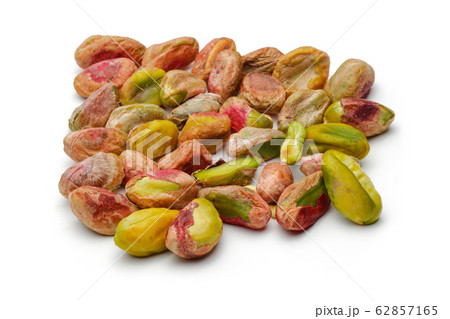 Heap of peeled pistachio nuts isolated Heap of peeled pistachio nuts isolated 62857165