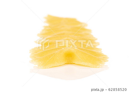 Yellow farfalle pasta isolated on white 62858520