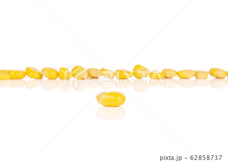 Yellow canned corn isolated on white Yellow canned corn isolated on white 62858737