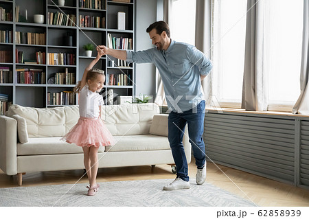 Happy father have fun play with little daughter 62858939