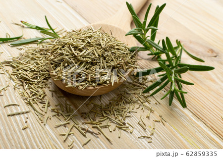 Pile of Dry Rosemary on Wooden Background Top View 62859335