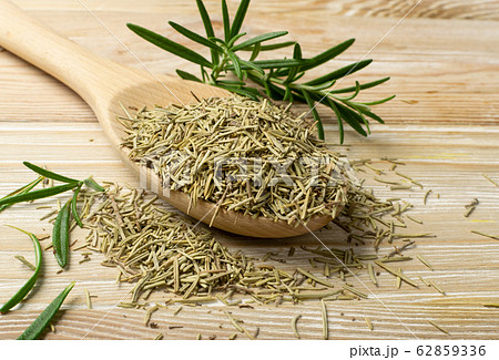 Pile of Dry Rosemary on Wooden Background Top View 62859336