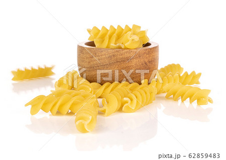Yellow fusilli pasta isolated on white Yellow fusilli pasta isolated on white 62859483