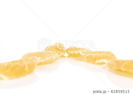 Dried yellow pineapple isolated on white Dried yellow pineapple isolated on white 62859515