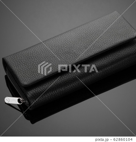 men's wallet on a black background 62860104