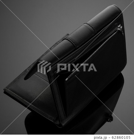 men's wallet on a black background 62860105
