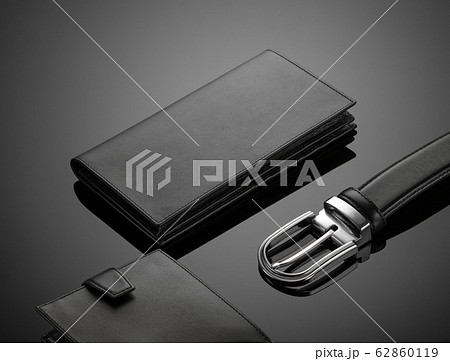 men's wallet on a black background 62860119