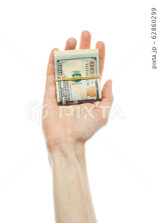 US dollars cash money in male hand isolated on 62860299