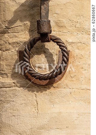 Old wrought iron ring to tie the horses - Bologna Italy 62860667
