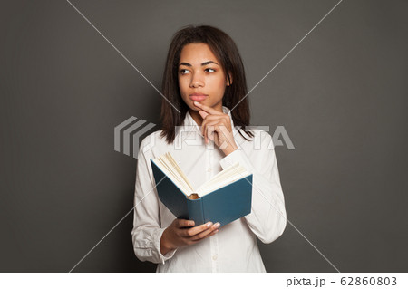 Thinking mixed race ethnicity black woman student Thinking mixed race ethnicity black woman student 62860803