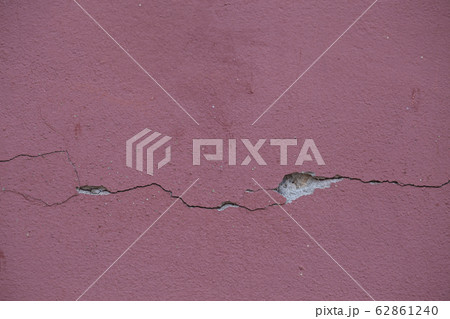 Cracked concrete vintage wall background. Old Cracked concrete vintage wall background. Old 62861240